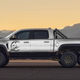 Illustration for article titled When you need your MURRICA-mobile to have that little bit more MURRICA, Hennessey is here for you with a Ram TRX 6-wheel conversion